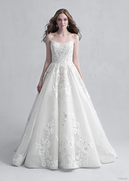 A woman wearing the Aurora wedding gown from the 2021 Disney Fairy Tale Weddings Platinum Collection