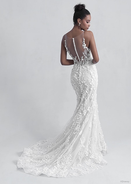 A back side view of a woman in the Tiana wedding gown from the 2021 Disney Fairy Tale Weddings Platinum Collection