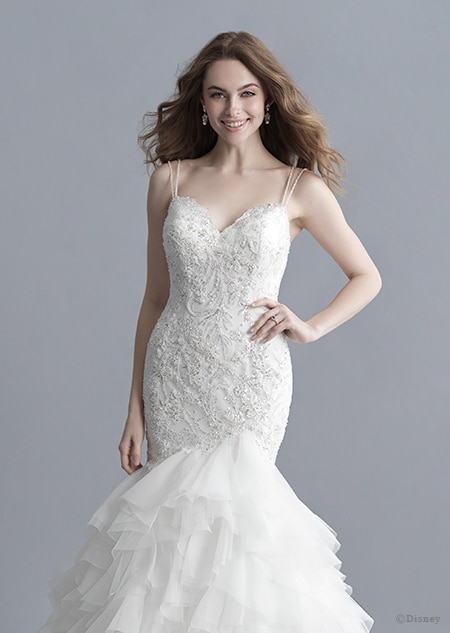 A woman in the Ariel wedding gown from the 2020 Disney Fairy Tale Weddings Platinum Collection