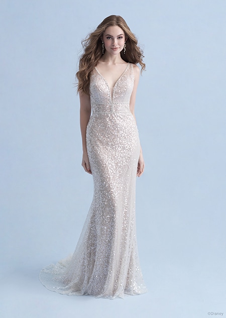 A woman dressed in the Ariel wedding gown from the 2021 Disney Fairy Tale Weddings Collection