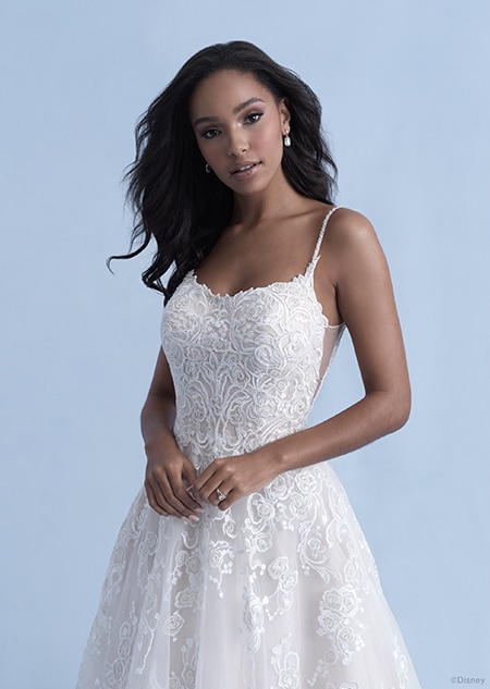 A woman in the Belle wedding gown from the 2021 Disney Fairy Tale Weddings Collection