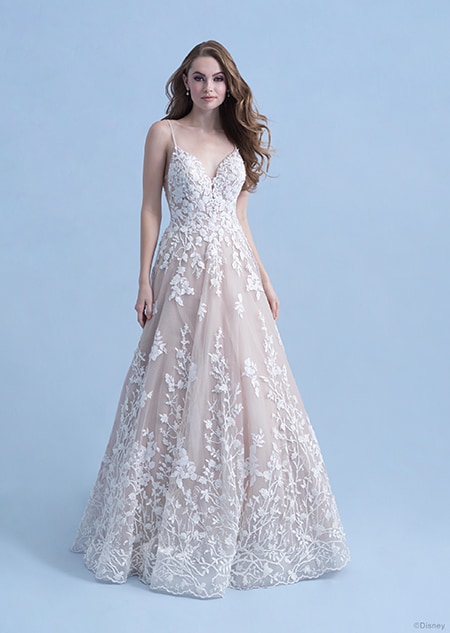 A woman in the Snow White wedding gown from the 2021 Disney Fairy Tale Weddings Collection