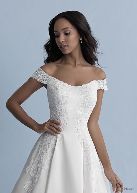 A woman in the Belle wedding gown from the 2020 Disney Fairy Tale Weddings Collection