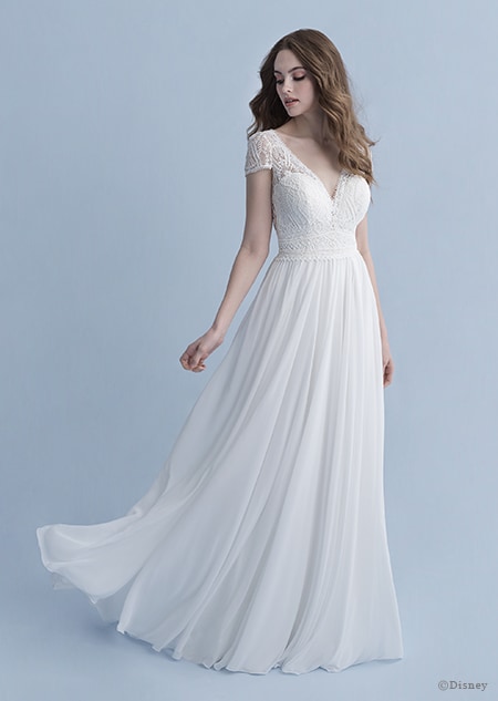 A woman in the Rapunzel wedding gown from the 2020 Disney Fairy Tale Weddings Collection