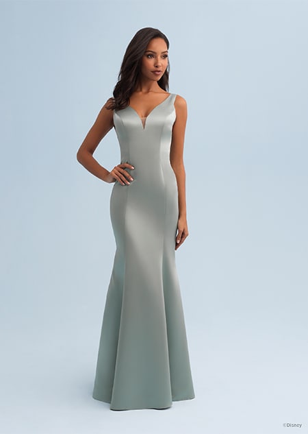 A woman wearing a Jasmine themed bridesmaid dress with a V neckline