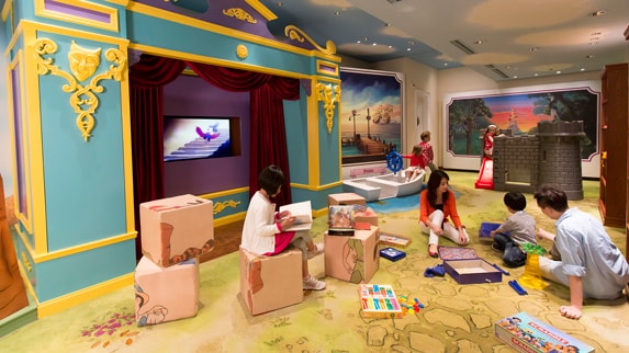 Children and parents playing in the Kids' Play Area at Disney's Hollywood Hotel