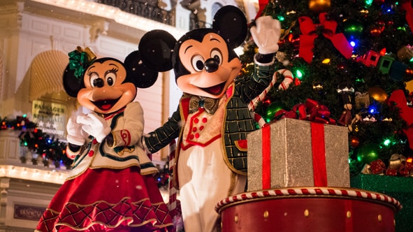 mickey and minnie mouse dressed in holiday attire standing beside a christmas tree and presents - Mickeys Merry Christmas mickey and minnie mouse dressed in holiday attire standing beside a christmas tree and presents - Mickeys Merry Christmas