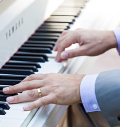 A man plays the piano