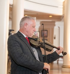 A man playing the violin